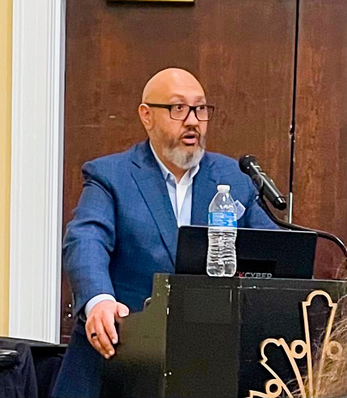 Rock Lambros speaking at a conference