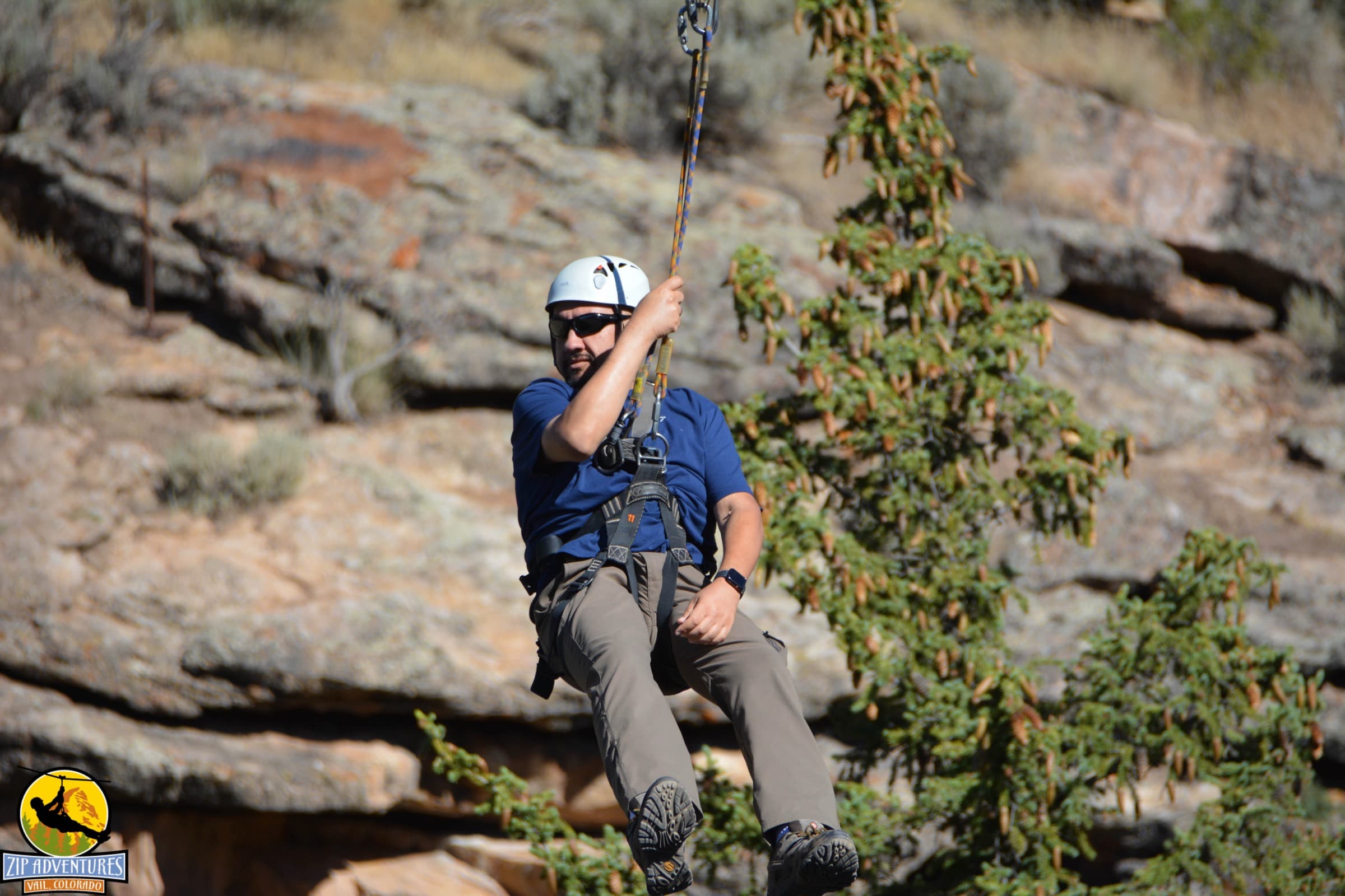Rock Lambros ziplining in the Colorado high country